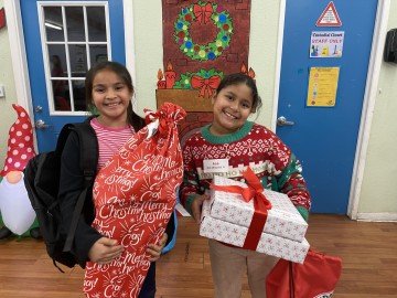 Team Panda Spreads Holiday Cheer to 400+ Local Students